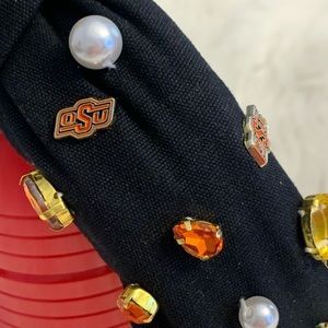 Brianna Cannon Headband with jewels.